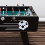 Cougar Arena TS Fußballtisch mit schwarzem Korpus und Fußball-Dekor. Ideal für Spiel & Spaß.