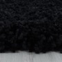 Detailansicht: Schwarzer Ayyildiz Hochflorteppich Sydney, 60x110 cm. Flauschiger Shaggy Teppich.
