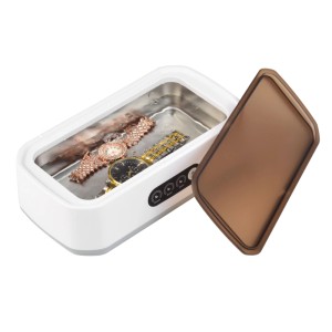 Weißer Technaxx Ultraschallreiniger LX-058 mit Uhren im Wasser, Deckel offen. Reinigt Schmuck, Brillen schonend.