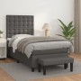 Graues Boxspringbett (80x200 cm) mit Matratze, Kopfteil und Bank aus Kunstleder.