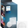 Philips Hue Tap Dial Schalter in Weiß, mit Verpackung und Nahansicht des Schalters.