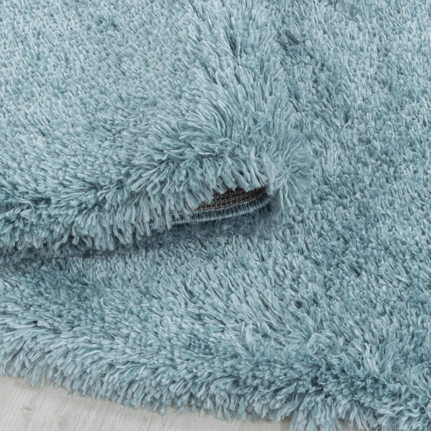 Blauer Ayyildiz Hochflorteppich Fluffy, 140x200 cm. Weicher Shaggy Teppich mit Jute-Rückseite.