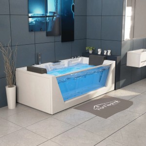 TroniTechnik Whirlpool Mykonos mit Wasserfall, Hydromassage und Farblicht in moderner Bad-Umgebung.