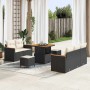 8-teiliges Garten-Sofa-Set aus Poly Rattan in Schwarz mit Tisch und Kissen.