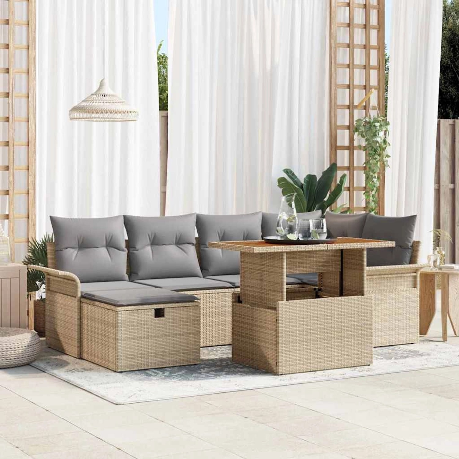 Beiges 7-teiliges Garten-Sofa-Set aus Poly Rattan mit Kissen und Stauraum.