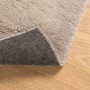 Sandfarbener, waschbarer Kurzflorteppich (80x200 cm) mit rutschfester Unterseite.