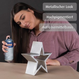Frau lackiert Deko-Stern mit belton Buntlack Perfect Silver Metal seidenmatt. Effektfarbe für Metall-Look.