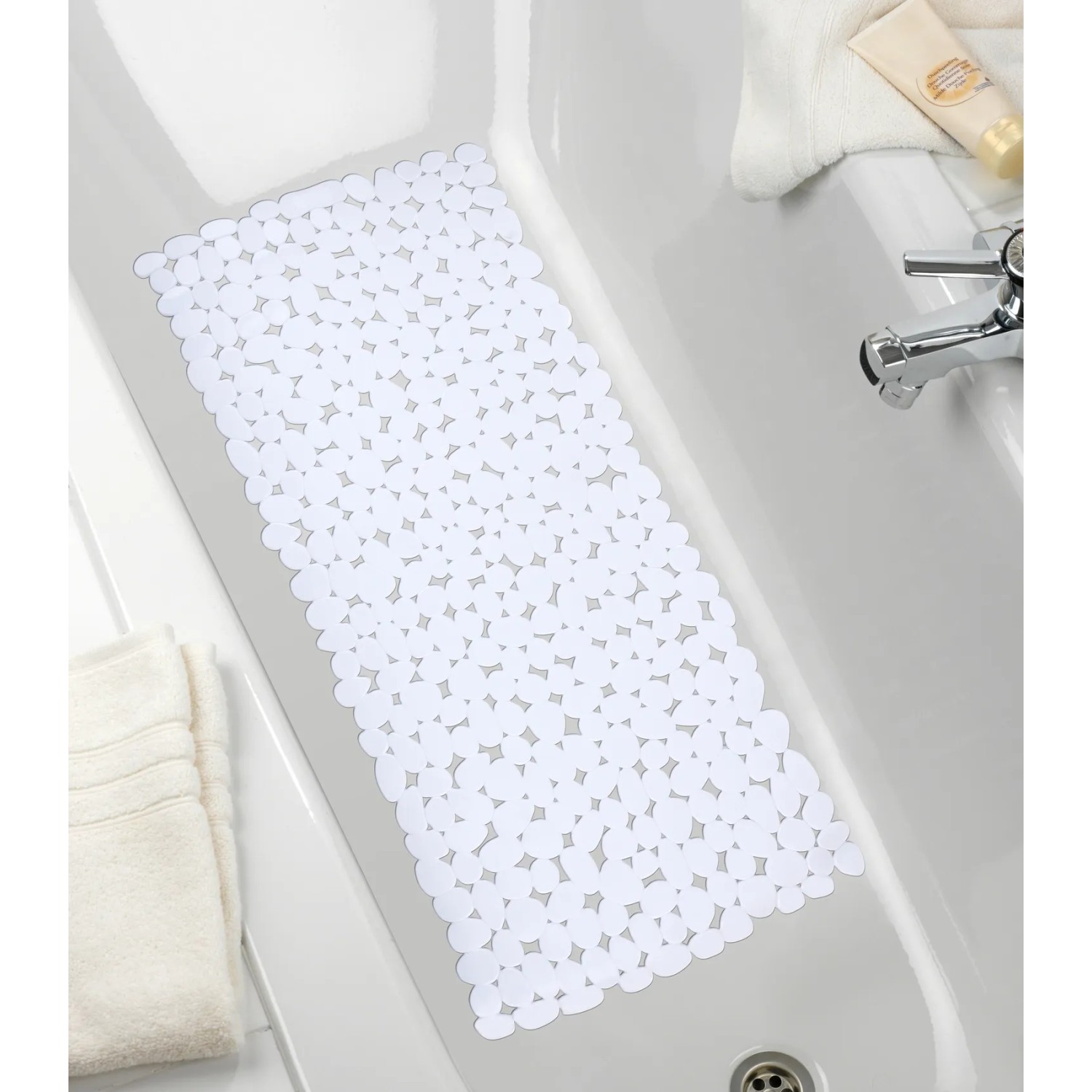 Weiße Wenko Wanneneinlage Paradise, 71x36 cm, mit Saugnäpfen in Badewanne.