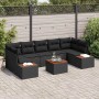 Schwarzes 8-teiliges Garten-Sofa-Set aus Poly Rattan mit Kissen und Tisch.