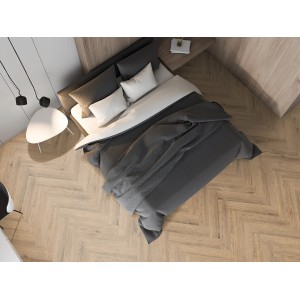 Helle Fischgrät Laminatfläche Classen Ville Rello Oak in einem Schlafzimmer.