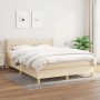 Cremefarbenes Boxspringbett 140x200 cm mit Stoffbezug und gestepptem Kopfteil.