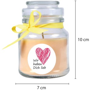Gelbe Duftkerze im Glas mit Herz und Schleife, Vanille Duft. Kerze für entspannte Atmosphäre.