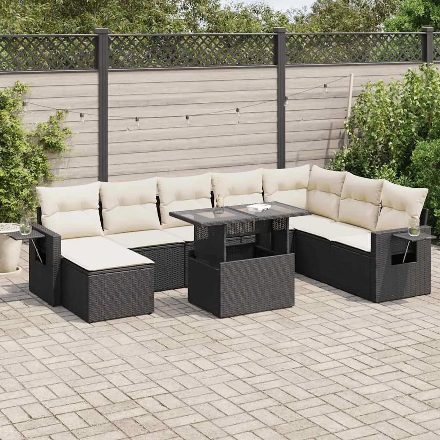 Schwarze 9-tlg. vidaXL Garten-Sofagarnitur aus Poly Rattan mit cremefarbenen Kissen.