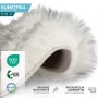 Flauschiges KARAT Kunstfell Nelly Black Tip, Detailaufnahme der Rückseite in Lederoptik und der sauberen Nahtkante.