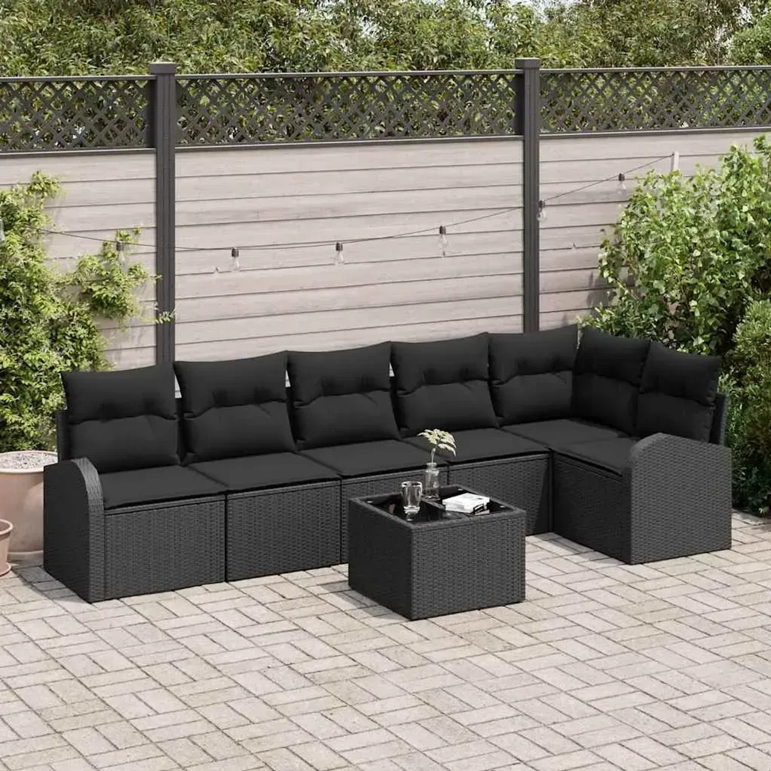 Schwarzes 7-teiliges Garten-Sofa-Set aus Poly Rattan mit Kissen von vidaXL.