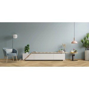 Klebe-Vinylboden Herringbone in heller Holzoptik. Moderner Vinylboden im Wohnraum mit Möbeln.