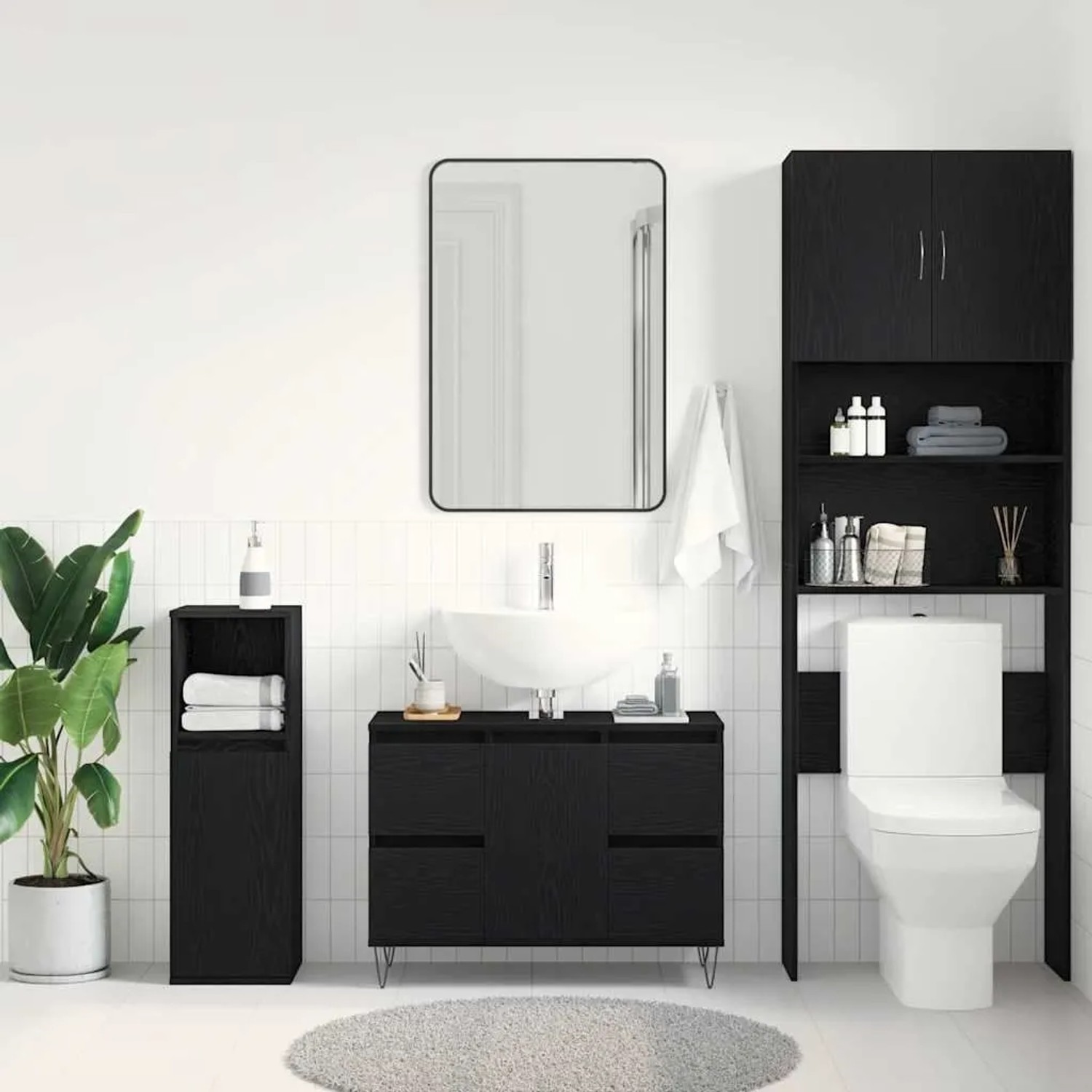 vidaXL Waschbeckenschrank in Schwarz Eichen-Optik mit passenden Badmöbeln im Badezimmer.