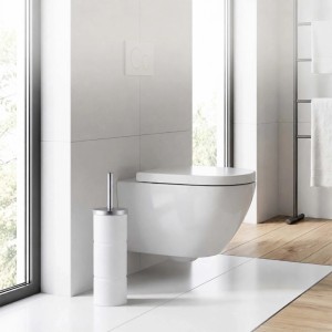 Weiße Relaxdays WC-Bürstengarnitur aus Metall mit silbernem Griff neben einer modernen Toilette im Bad.