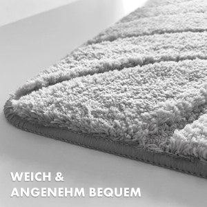 Detailaufnahme: Silberne Karat Badematte Maris mit Blattstruktur, weicher Badvorleger/Badteppich.