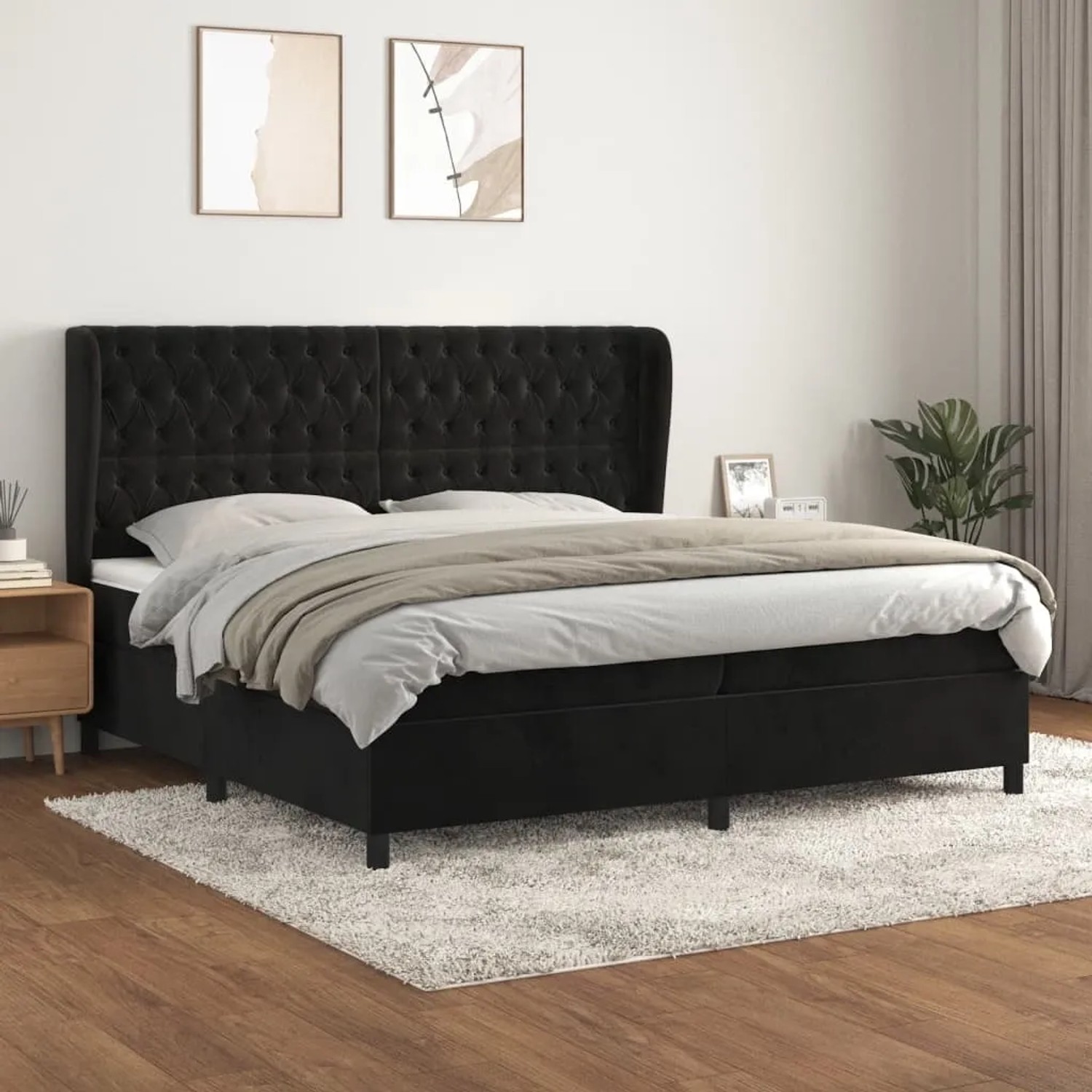 Schwarzes vidaXL Boxspringbett (200x200 cm) mit Matratze und Samtbezug.