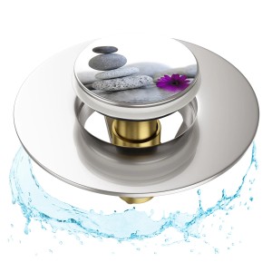 Sanilo Pop Up Waschbeckenstöpsel mit Energy Stones Motiv und Wasser.