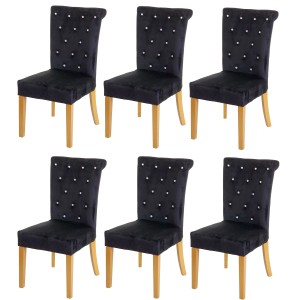 6er-Set: Schwarze Polsterstühle mit Knopfsteppung und goldfarbenen Beinen.
