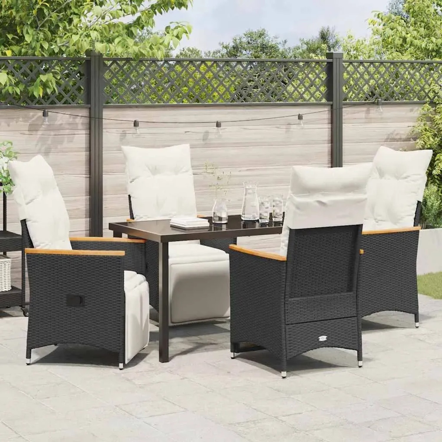 Schwarze 5-tlg. vidaXL Garten Essgruppe aus Poly Rattan mit Kissen.