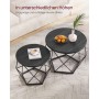 Vasagle Couchtisch 2er Set, runde Tische in Schwarz mit geometrischem Stahlgestell.