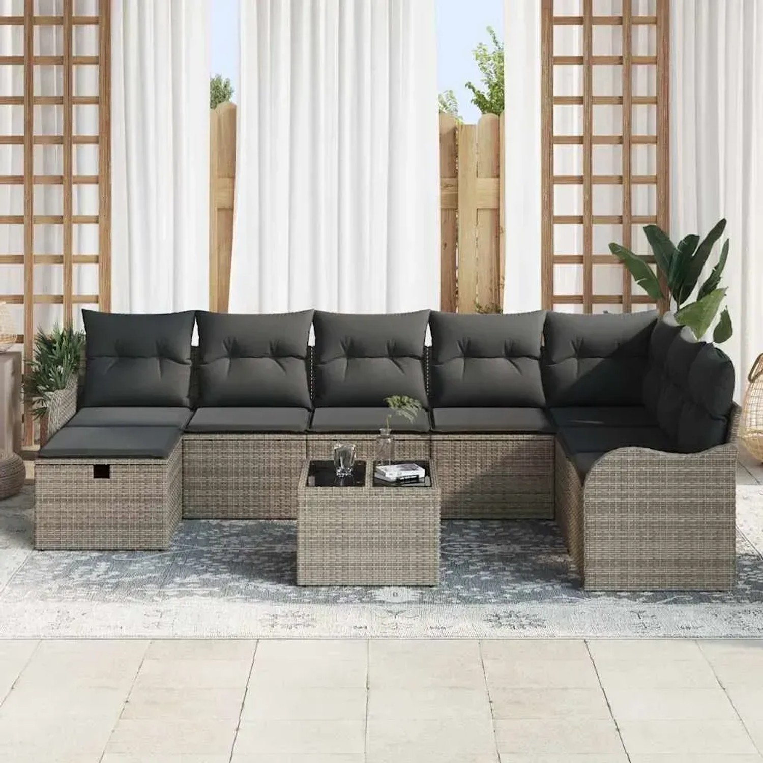 Graues 9-teiliges vidaXL Garten-Sofa-Set aus Polyrattan mit Kissen und Stauraum.
