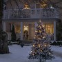 Konstsmide LED Baumkette mit 25 Topbirnen, bernsteinfarben, für Außen, vor einem verschneiten Haus.
