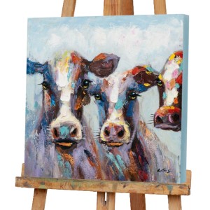 Art Universe Leinwandbild Bunte Kühe 60x60 cm. Farbenfrohes Tiermotiv auf Leinwand, auf Staffelei präsentiert.