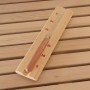 Sauna Sanduhr aus Holz mit rotem Sand auf Saunabank der SKYLINE BIG Sauna.