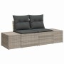 Hellgraues 11-teiliges Garten-Sofa-Set aus Poly Rattan mit grauen Kissen.