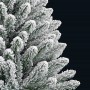 Detailaufnahme: Grün-weißer, künstlicher Weihnachtsbaum mit Schnee-Effekt.