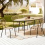 Beliani Gartenstühle, 4er Set, naturfarbenes Rattan mit schwarzen Metallbeinen.