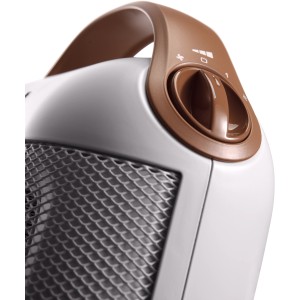 Detailaufnahme: Weißer DeLonghi Keramikheizer mit braunem Griff und Drehregler.