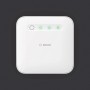 Weißer Bosch Smart Home Controller II zur Hausfunksteuerung mit grünen LEDs.