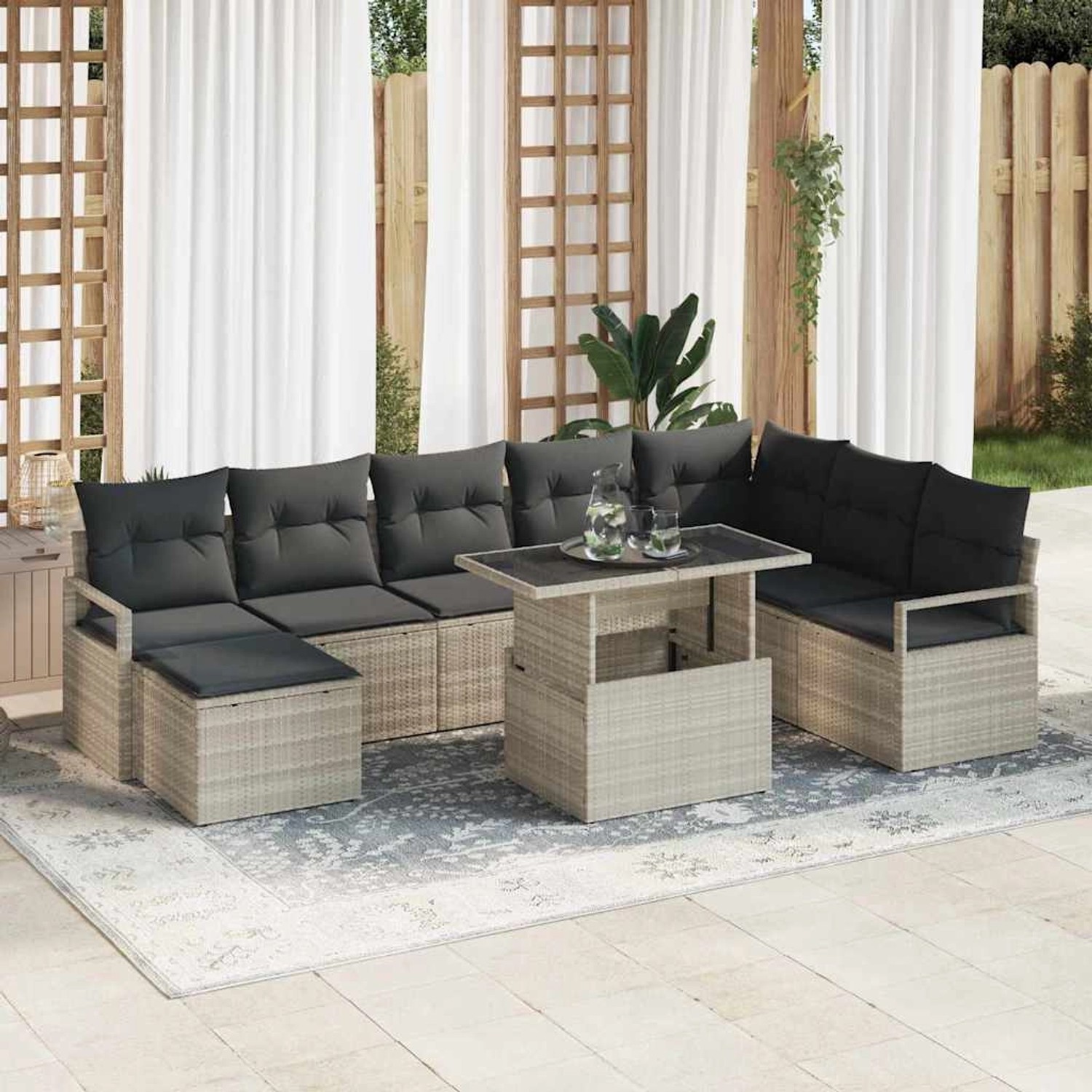 Hellgraues 9-teiliges vidaXL Garten-Sofa-Set aus Poly Rattan mit Tisch und Auflagen.