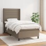 Taupes Boxspringbett 90x190 cm mit Matratze und hohem Kopfteil.