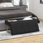 Schwarze HOMCOM Polsterbank mit Samtoptik, goldenen Beinen und offenem Stauraum am Bettende im Schlafzimmer.
