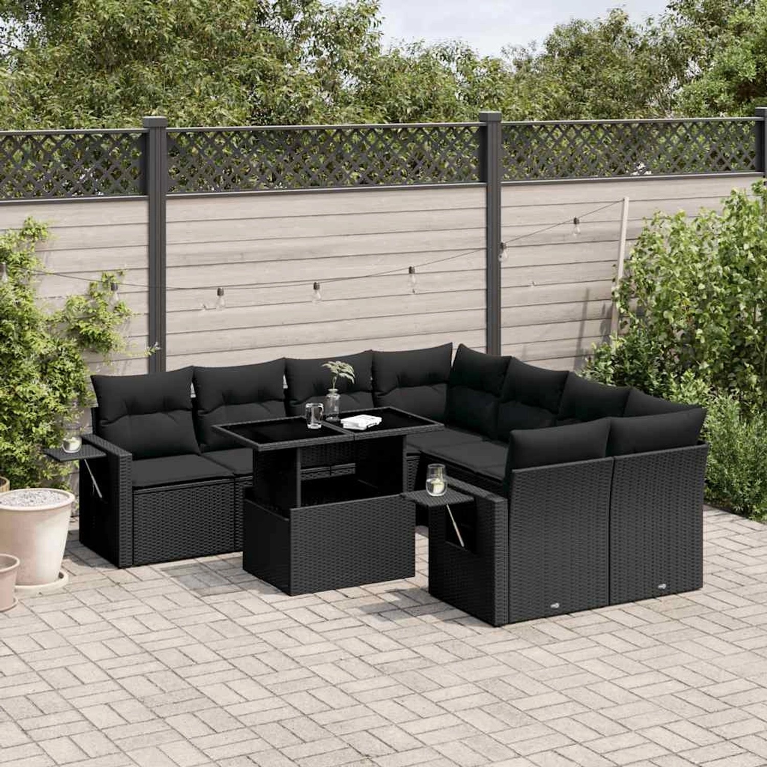 Schwarze 9-tlg. vidaXL Garten-Sofagarnitur aus Poly Rattan mit Kissen und Tisch.