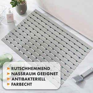 Graue, antibakterielle KARAT Fußmatte mit Drainagefunktion, ideal für Nassbereiche.