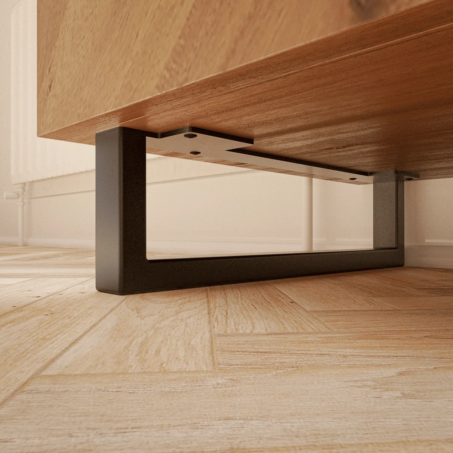 Schwarze HEVVA Möbelfüße GRAZ (2er Set) unter Holzmöbelstück. Möbelbeine für DIY-Projekte.