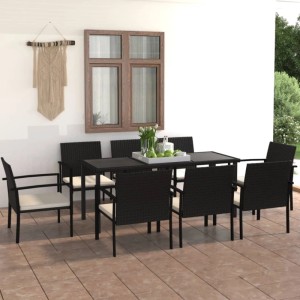 Schwarze 9-tlg. Garten-Essgruppe aus Rattan mit Tisch und Stühlen mit cremefarbenen Kissen.
