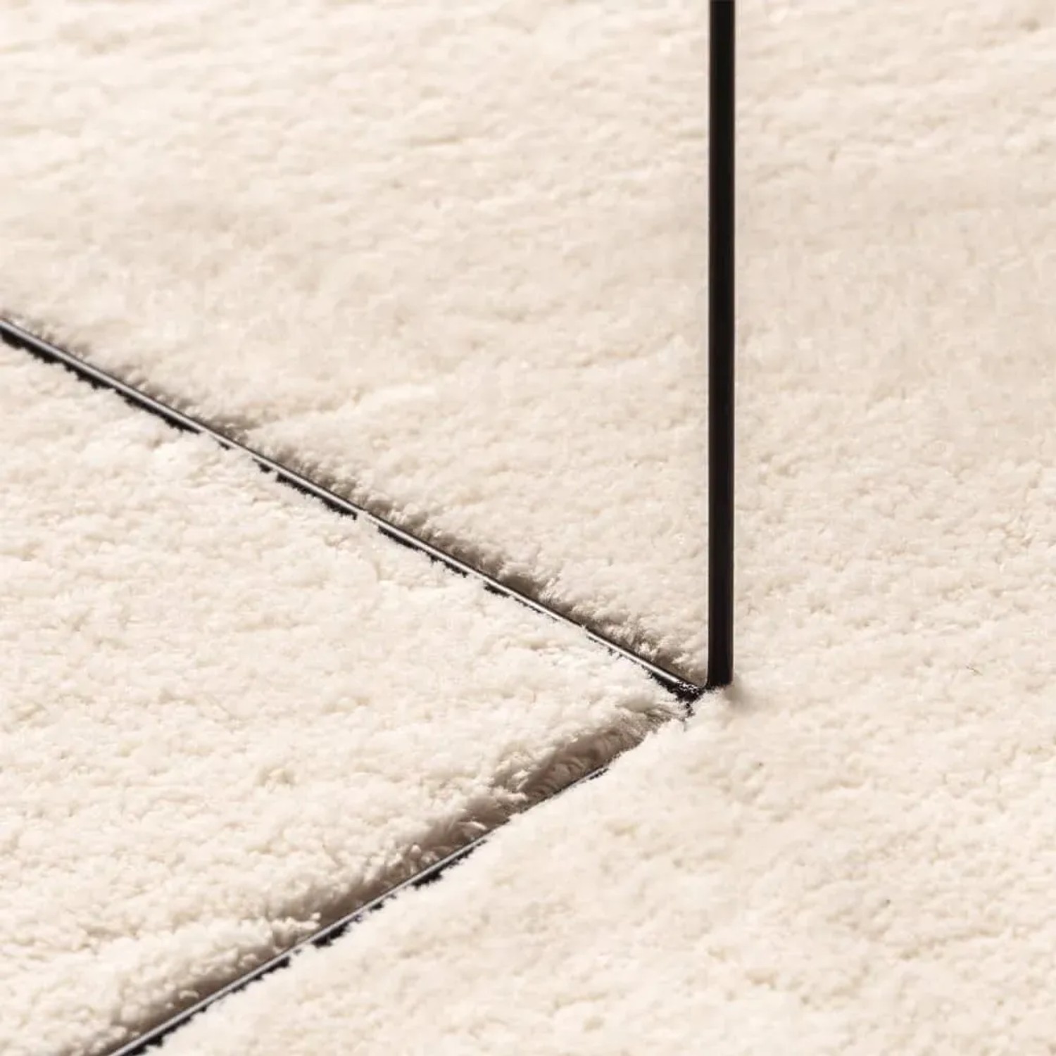 Detailansicht: Weicher, beiger Kurzflor Teppich, 100 cm Durchmesser.