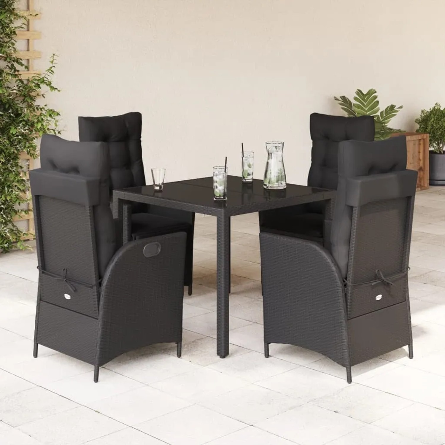 Schwarze 5-tlg. Garten-Essgruppe aus Polyrattan mit Tisch, Stühlen und Kissen für Terrasse oder Garten.