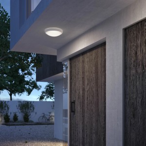 Moderne, weiße Philips Doris LED-Außendeckenleuchte (6W, 4000K) an Hauswand.