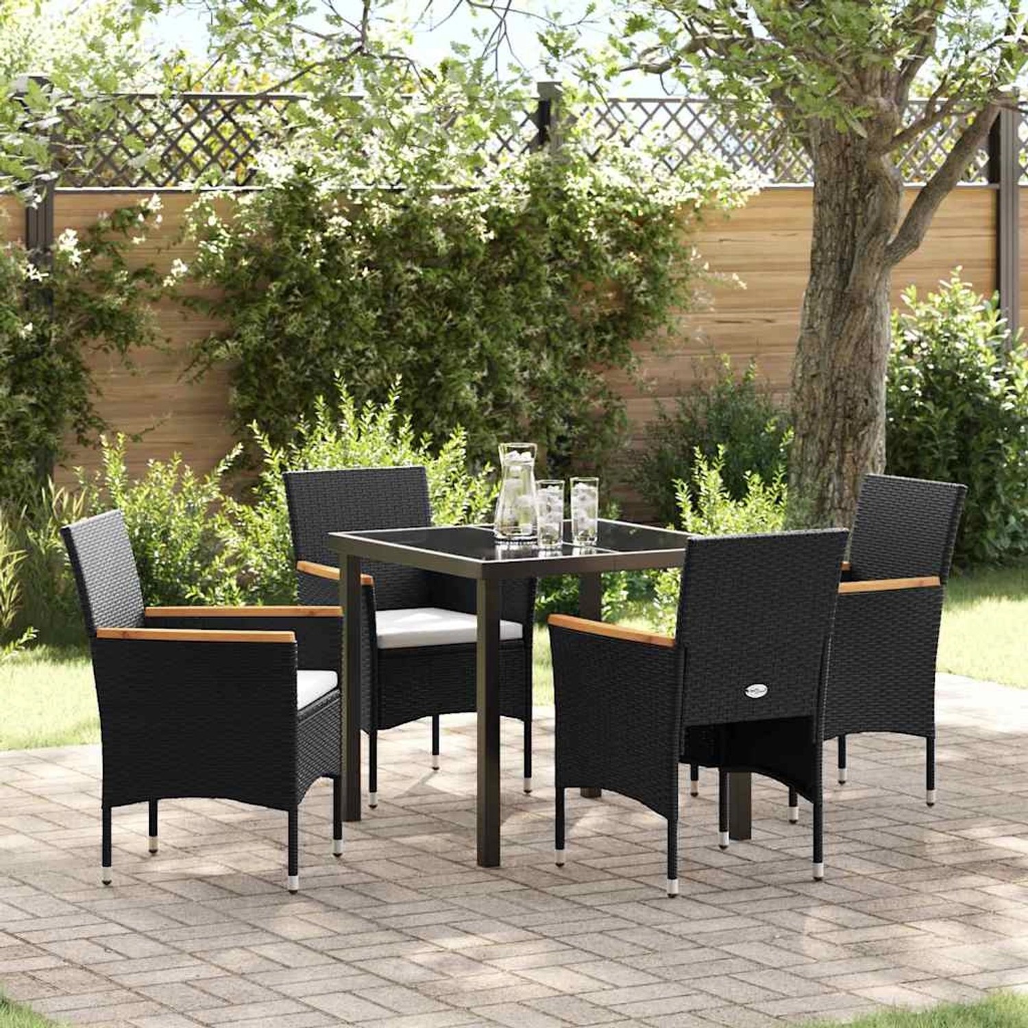 Schwarze vidaXL Garten Essgruppe mit 4 Stühlen und Tisch aus Poly Rattan mit Kissen.