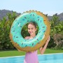 Bestway Schwimmring Sweet Donut Ø 77 cm mit bunten Streuseln und Mädchen am Pool.
