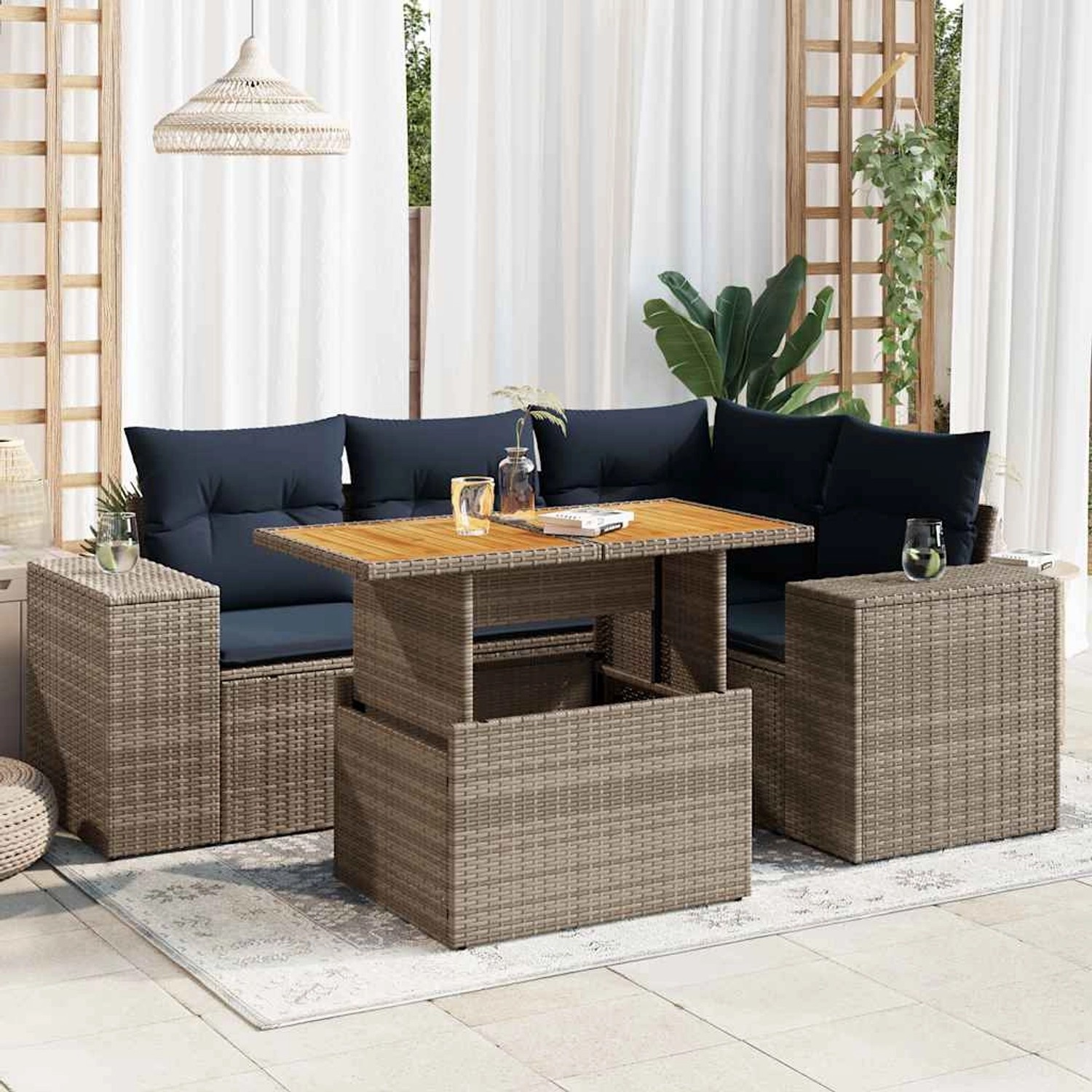 Graue 5-tlg. vidaXL Garten-Sofagarnitur aus Polyrattan mit marineblauen Kissen und höhenverstellbarem Tisch.